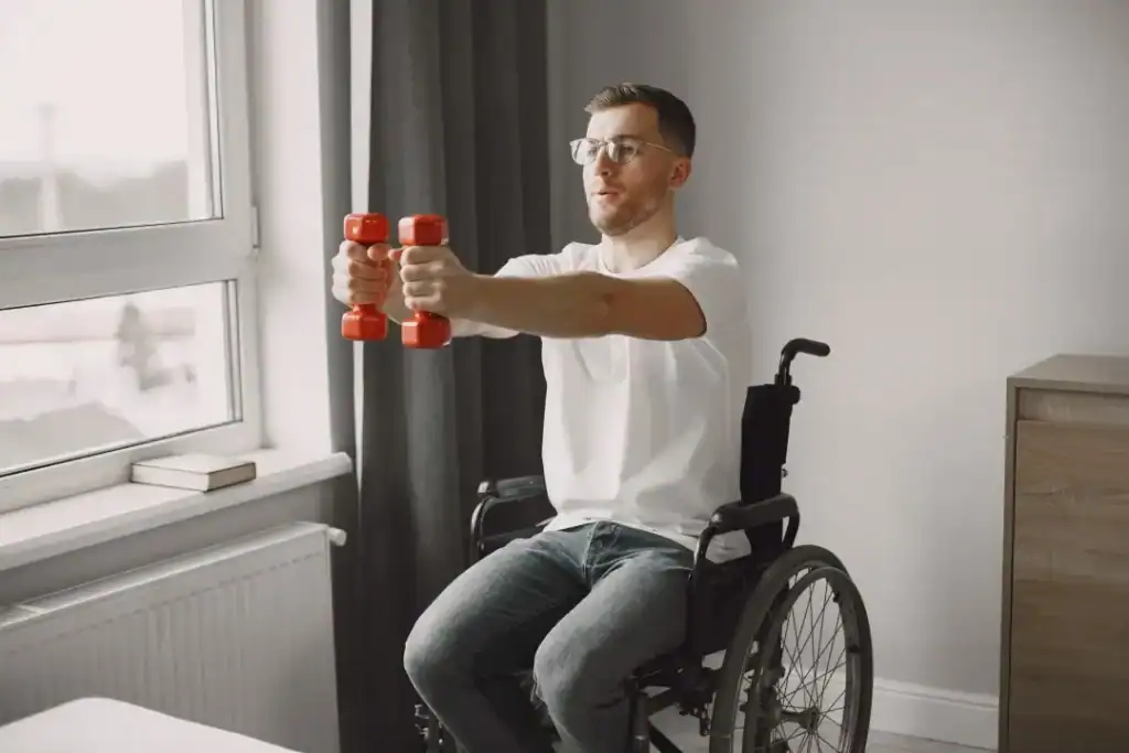 Empowering Weight Loss: A Comprehensive Guide for Individuals with Disabilities 1 Image of man doing exercise in his wheelchair to aid weight loss Amersham
