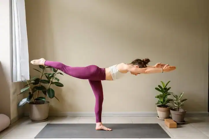 Achieving the Perfect Tone: How Often Should You Exercise for Results? 1 Woman doing Yoga exercise Amersham to help with toning the body.