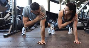 Sculpting Sleek Arms: The Essential Role of Cardio in Toning Without Bulking Up 1 Image of man and woman doing Cardio Amersham to tone their arms.